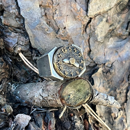 Analog Clock Design Silver Spinner Ring on the tree branch